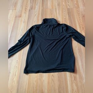 it a soft stretchy black turtle neck shirt